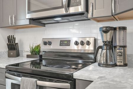 Full stove & oven ready for home-cooked meals any time of day.