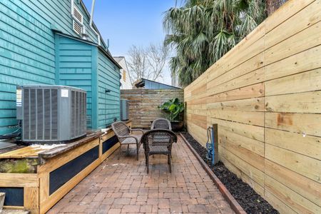 Private outdoor space tucked between fences — your own quiet escape.