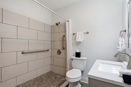 Clean, bright bathroom w/ a fresh, airy feel