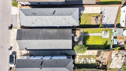 Aerial view of the property & its surroundings.