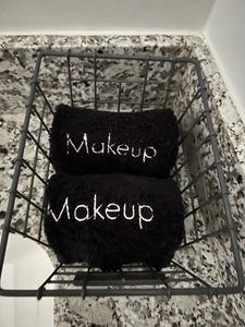 Soft makeup towels folded & ready — a thoughtful touch for every guest.