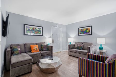 Modern living area w/ Smart TV & comfy seating for movie nights in.