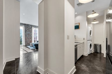 In-unit washer & dryer tucked neatly for a hassle-free stay.