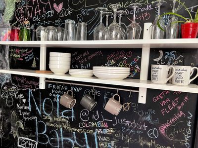 Fun chalkboard wall in the kitchen — leave a message or a little drawing.
