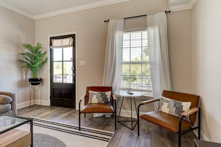 Cozy entryway nook — pull up a chair & start the morning w/ a quiet cup of coffee.