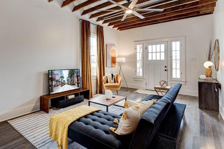 Cozy living room w/ a large TV — sink into the sofa & stream the night away.