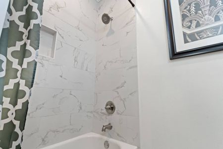 Marble-finish shower for a clean, spa-like start to your morning.