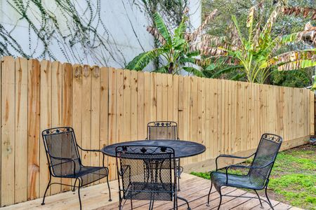 Dine al fresco at the bistro table tucked inside a private fenced yard.