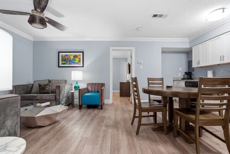 Airy dining & living space w/ room for the whole group.