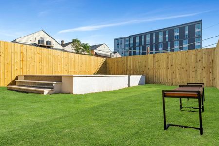 Fenced pool w/ a city backdrop — privacy meets a one-of-a-kind setting.