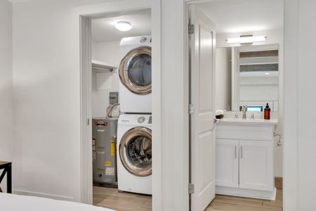 In-unit washer & dryer stacked & ready — laundry on your schedule.