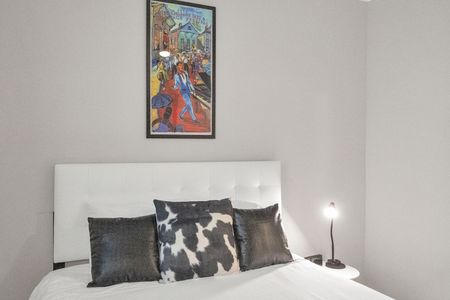 Vibrant NOLA-inspired bedroom art that brings the soul of the city indoors.