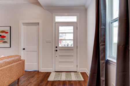 Bright front door entry sets a welcoming tone the moment you step inside.