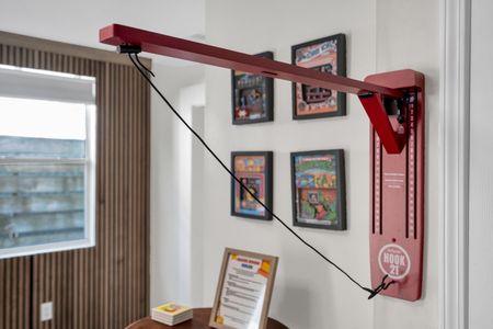 Framed retro gaming art decorating the walls — nostalgia at every turn.