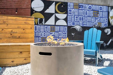 Cozy firepit nook perfect for winding down after a day out in the city.