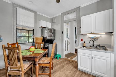 Bright, open kitchen w/ a cozy dining nook for easy mornings.