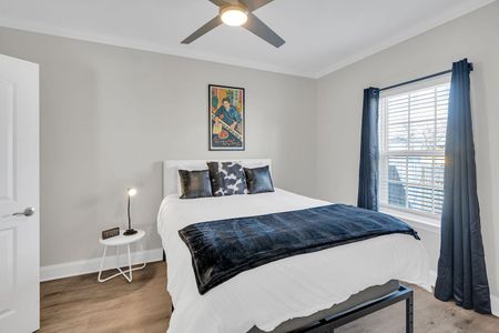 Elegant bedside setup w/ warm lighting for a calm, hotel-like feel.