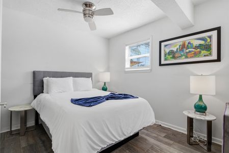 Serene bedroom w/ a plush bed designed for restful nights