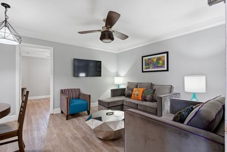 Relaxed living area w/ Smart TV & warm accent pillows