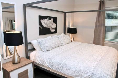 Sink into the king bed in the spacious master bedroom.