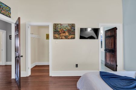Spacious bedroom w/ flat-screen TV & plenty of room to decompress.