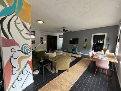 Airy living room w/ eclectic décor & plenty of space to unwind.