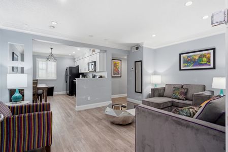 Bright, open kitchen w/ clean lines & polished finishes.
