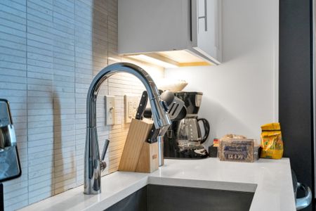 Enjoy a deep sink, under-cabinet lighting, and everything you need—from coffee to cookware—for a convenient, comfy stay.