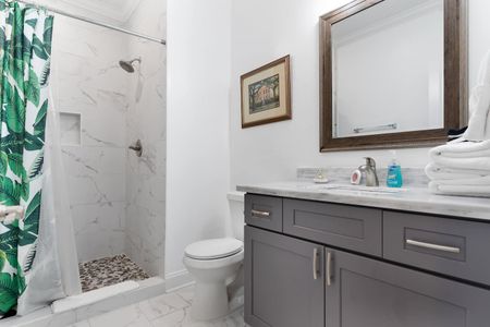 Second bathroom w/ sink & toilet — functional & fresh.