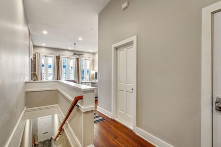Airy entryway w/ tall windows & clean lines welcoming you into the home.