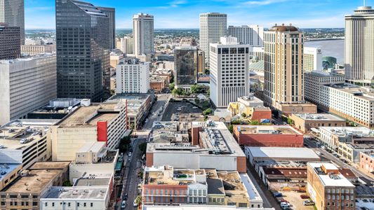 Bird's-eye view of the New Orleans skyline stretching into the horizon.