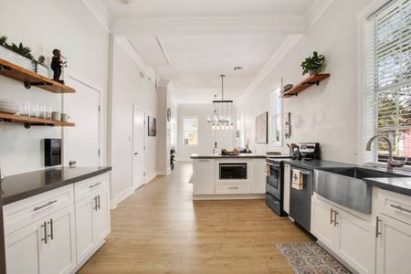Fully stocked kitchen w/ stainless appliances & plenty of counter space to cook & entertain.