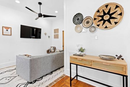 Airy staircase landing w/ curated wall decor — a stylish moment between floors.