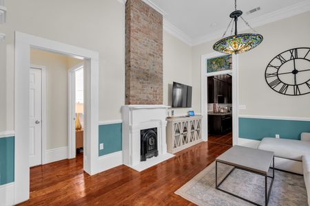 Open living area w/ chic décor, natural light & a bright, welcoming feel.
