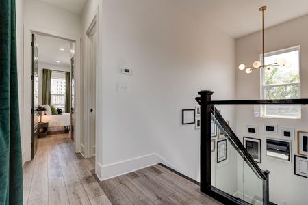 Staircase leading up to the rear bedroom & more living space.