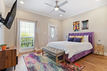 Sun-filled master bedroom w/ an ensuite bath for a private, relaxing retreat.