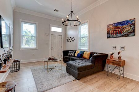 Kick back in the living room w/ a SmartTV — perfect for movie nights with the crew.