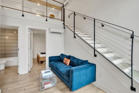 Clean lines & open space flow seamlessly between the living area & bath.