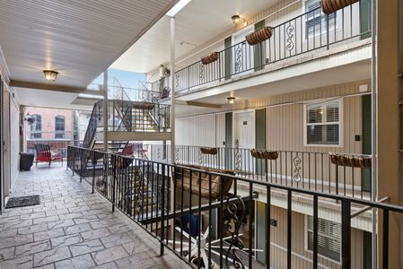 Covered balcony corridor w/ a breezy, classic feel