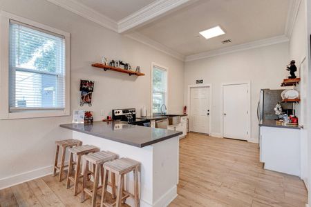 Casual kitchen bar seating — pull up a stool & enjoy a meal together.