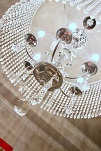 Sparkling chandelier adding a glamorous touch to the space.