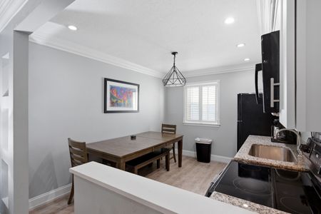 Airy dining area w/ natural light for easy shared meals.