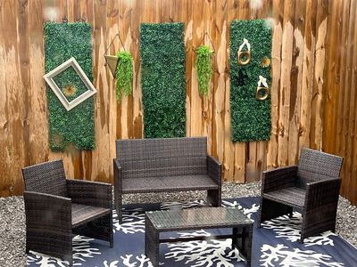 Unwind in the relaxing backyard, surrounded by lush greenery — your own private escape.