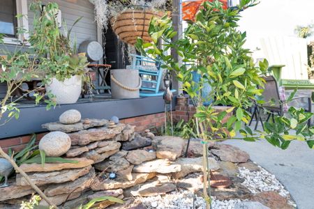 Zen garden w/ natural stone accents for a peaceful outdoor escape.