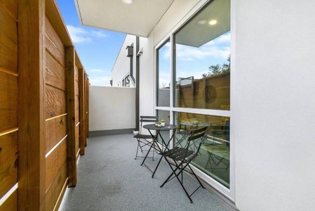 Unwind at the private outdoor seating area — perfect for morning coffee or evening chats.