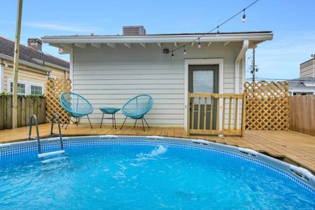 Refreshing above-ground pool in the backyard, ready for a sunny afternoon dip.