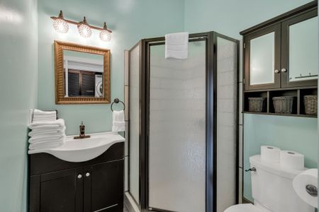 Walk-in shower and classic New Orleans charm