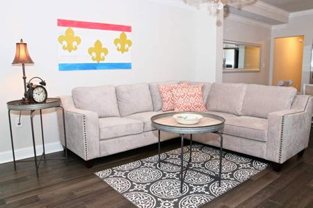 Living room dressed in local New Orleans-inspired décor & soft tones.
