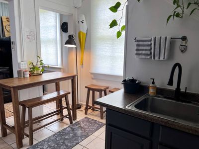 Casual dining nook w/ natural light — a quiet spot for morning coffee.