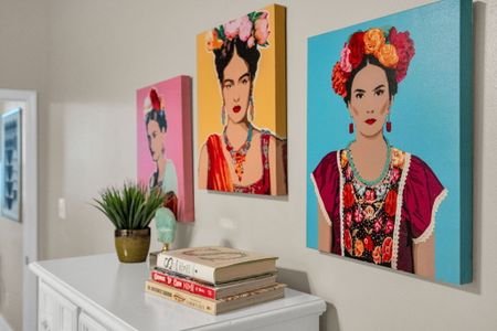 Bold, colorful wall art bringing vibrant local personality to the space.